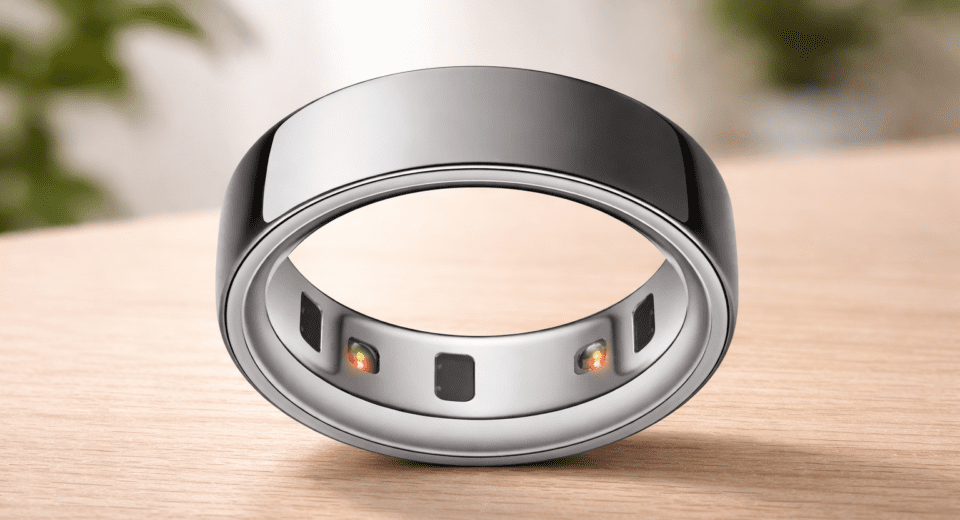 Sleek smart ring on wooden surface