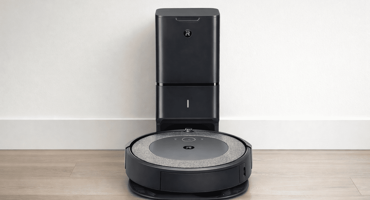 iRobot Roomba i3 plus robot vacuum on floor