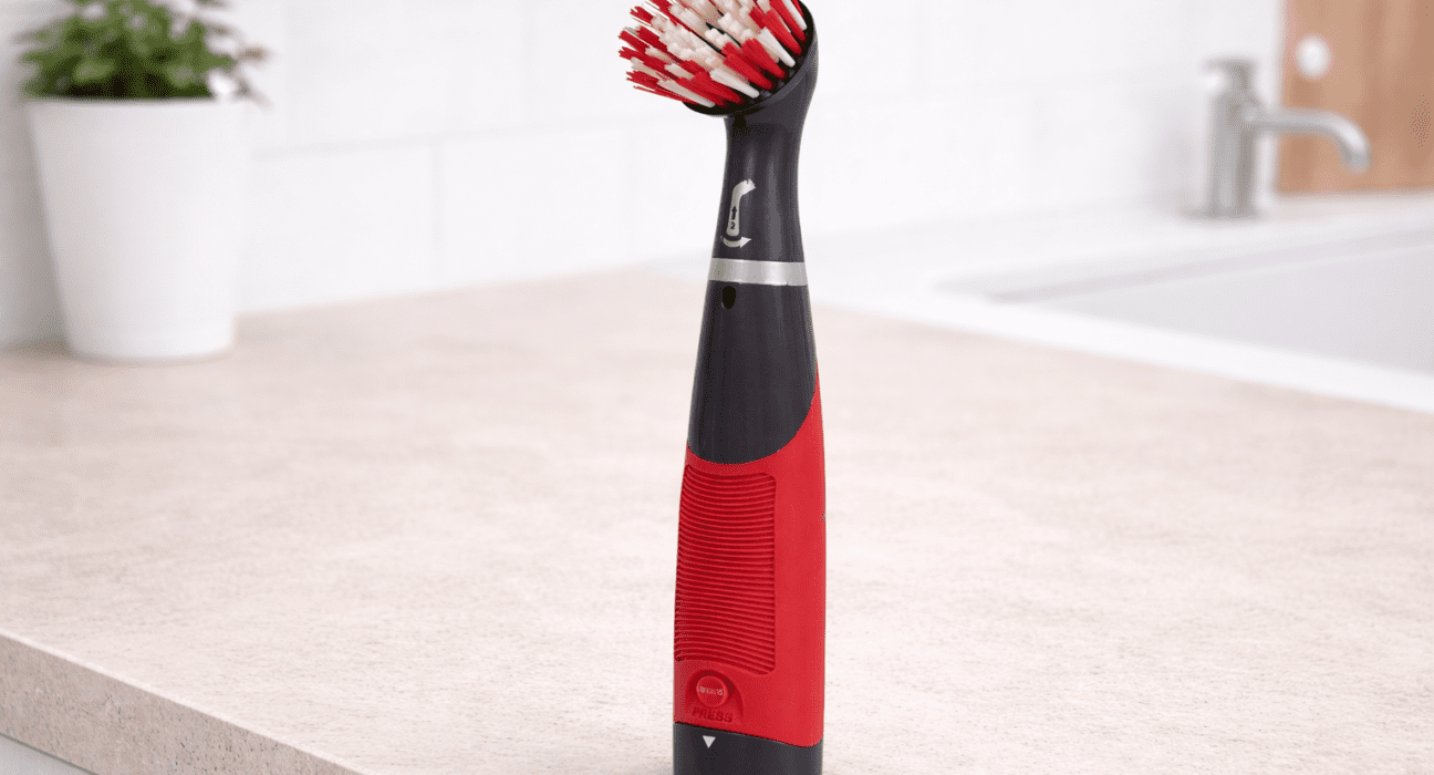 Rubbermaid Reveal power scrubber on bathroom surface