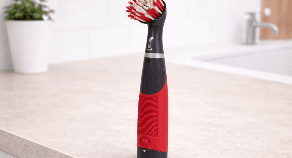 Rubbermaid Reveal power scrubber on bathroom surface